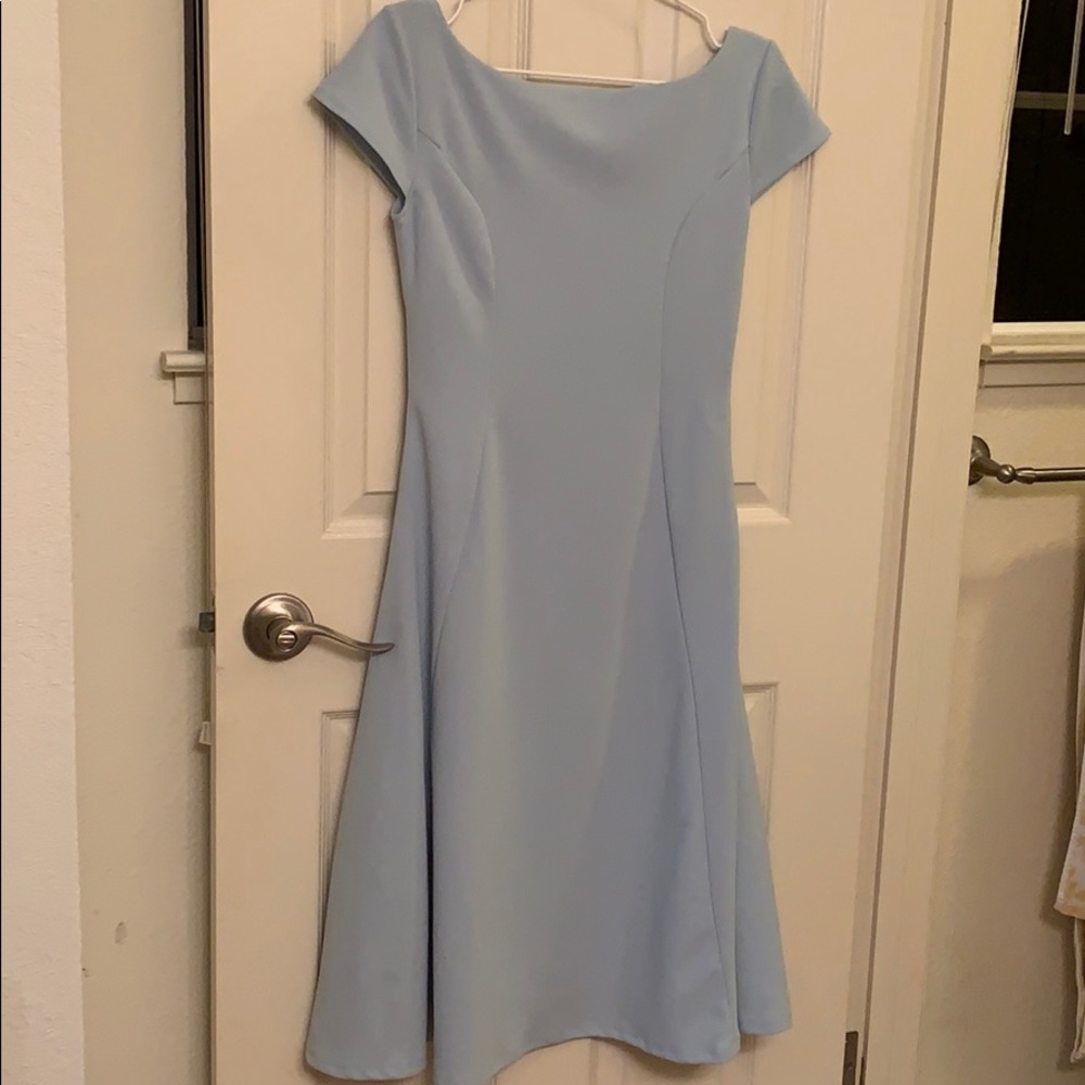Powder blue swing dress with crossbow backing